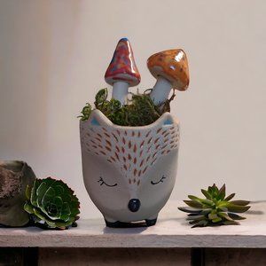 Clay fox with two mushrooms decoration
